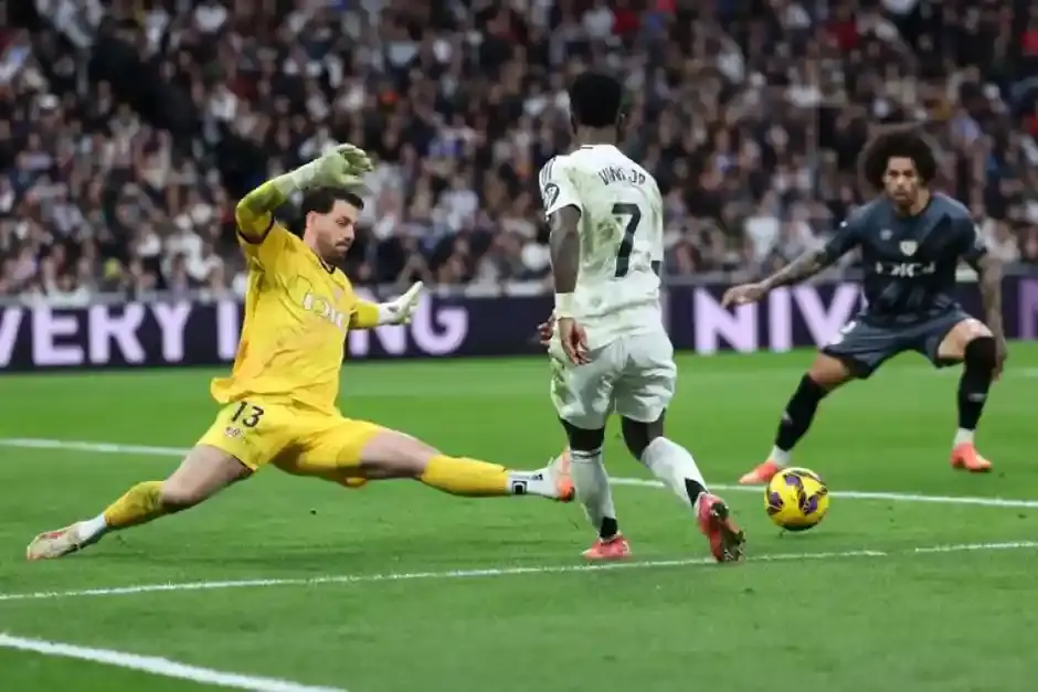 Kylian Mbappé and Vinícius Júnior played pivotal roles as Real Madrid secured a narrow victory over Rayo Vallecano.